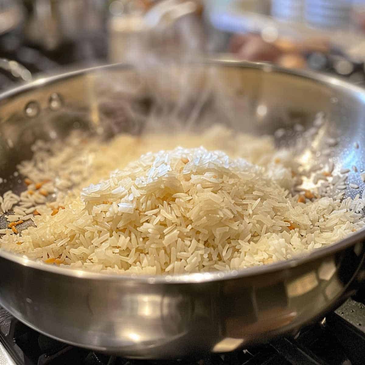 rice in a pan cooking