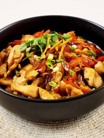 Thai Ginger Chicken in black bowl